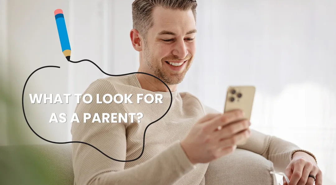 A parent choosing calm apps for kids on a phone